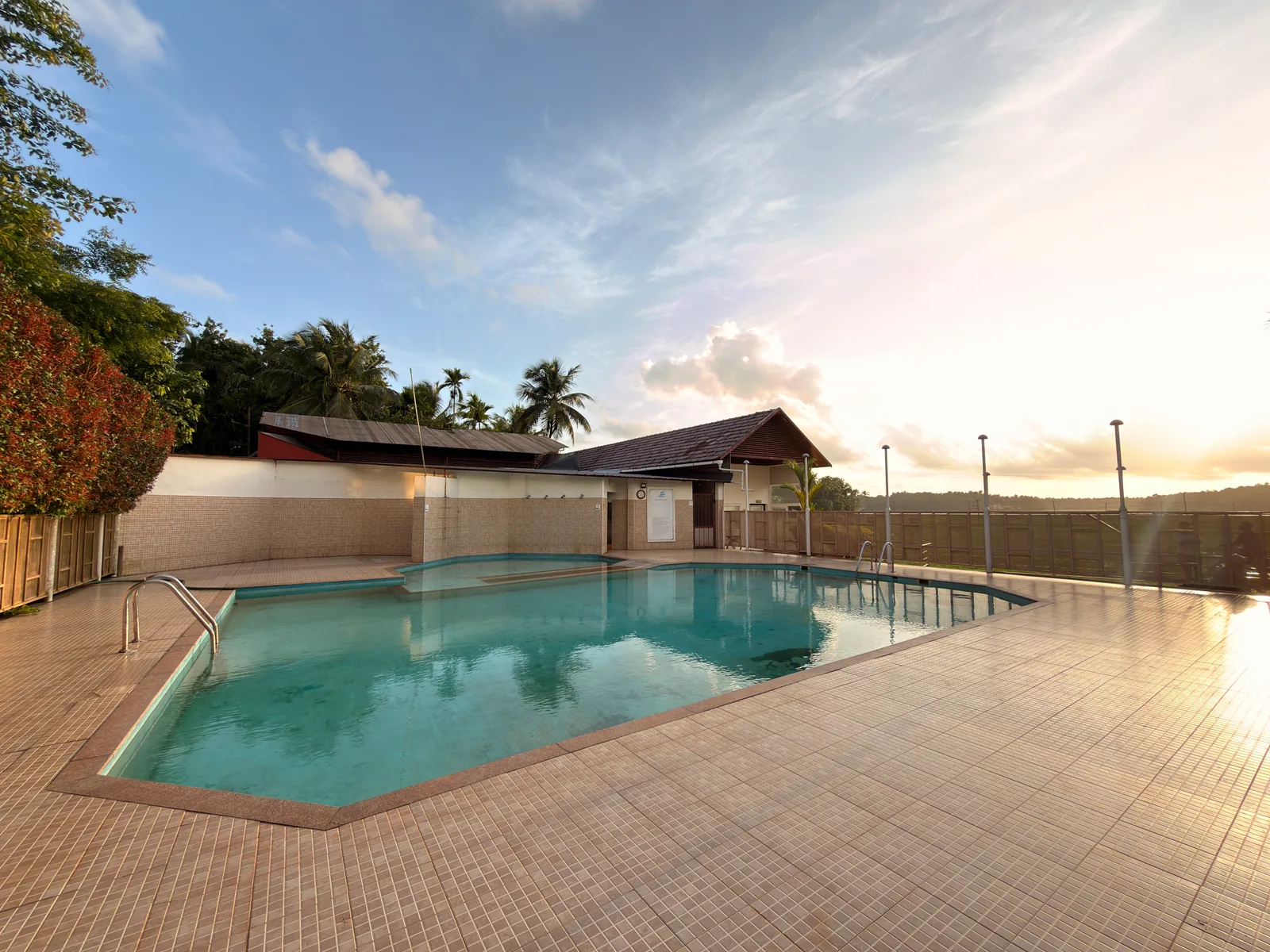 Therapeutic warm water hydrotherapy pool designed for zero-impact rehabilitation Temperature-regulated aquatic rehabilitation swimming pool at Ayurgreen Hospital Kerala